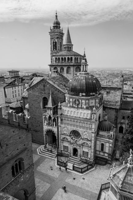 Black and white aerial view of Santa Maria Maggiore Basilica in Bergamo, Italy.