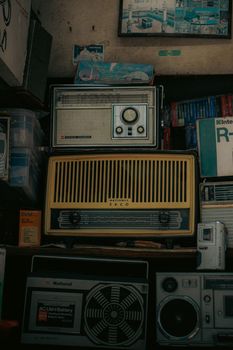 Explore a nostalgic collection of vintage radios and electronics, showcasing timeless technology.