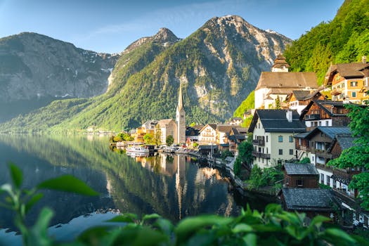 Picturesque view of Hallstatt village, lake, and mountain landscape in Austria.