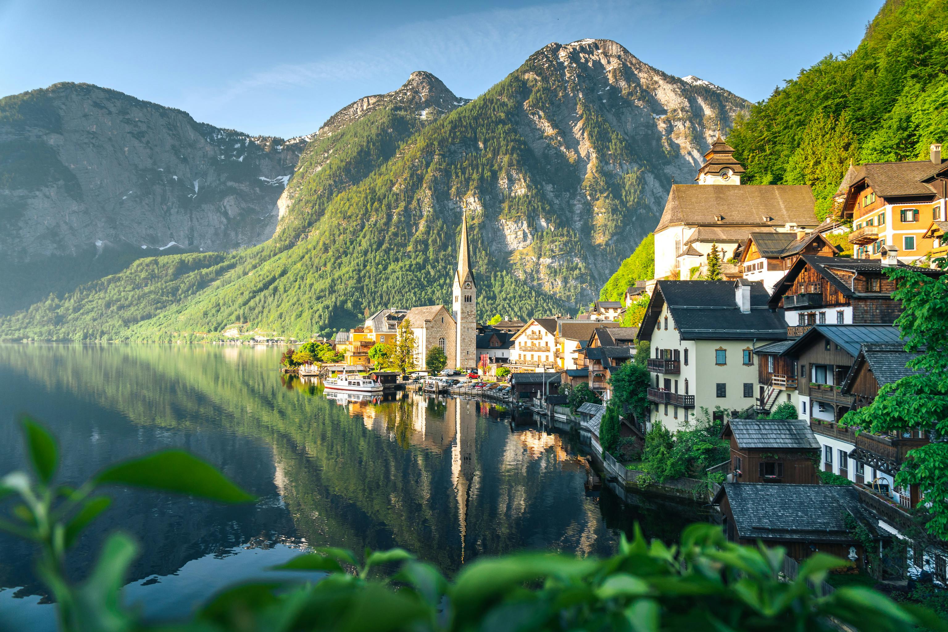 Free Picturesque view of Hallstatt village, lake, and mountain landscape in Austria. Stock Photo