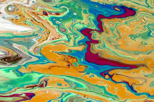 Colorful abstract paint flow resembling a natural landscape or map.