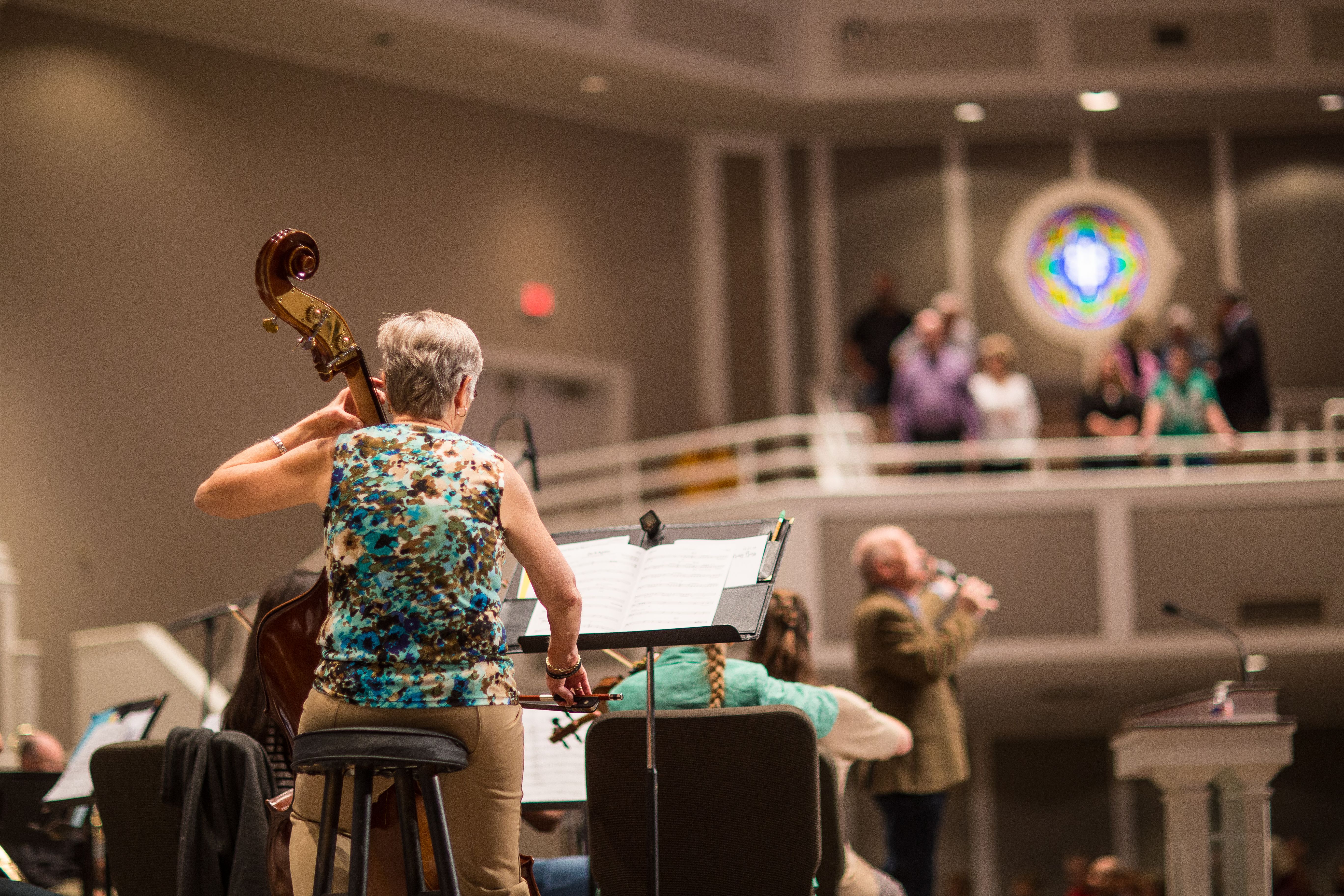 Live Concert Performance with Orchestra and Audience · Free Stock Photo