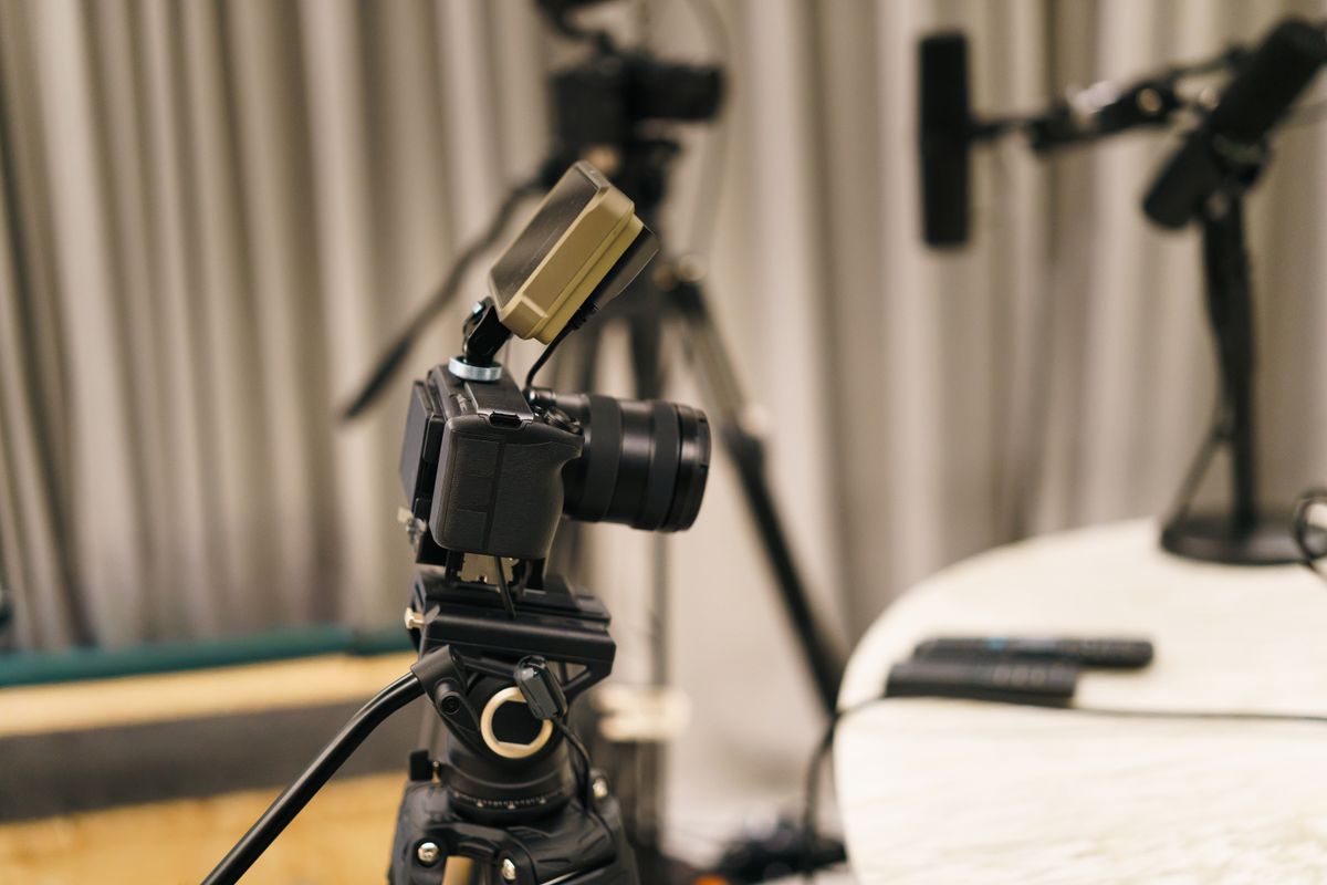 A podcast studio setup with a microphone, ready to be repurposed into slides