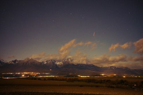 Free A stunning starry night view of the High Tatras mountains in Slovakia's Poprad region. Stock Photo