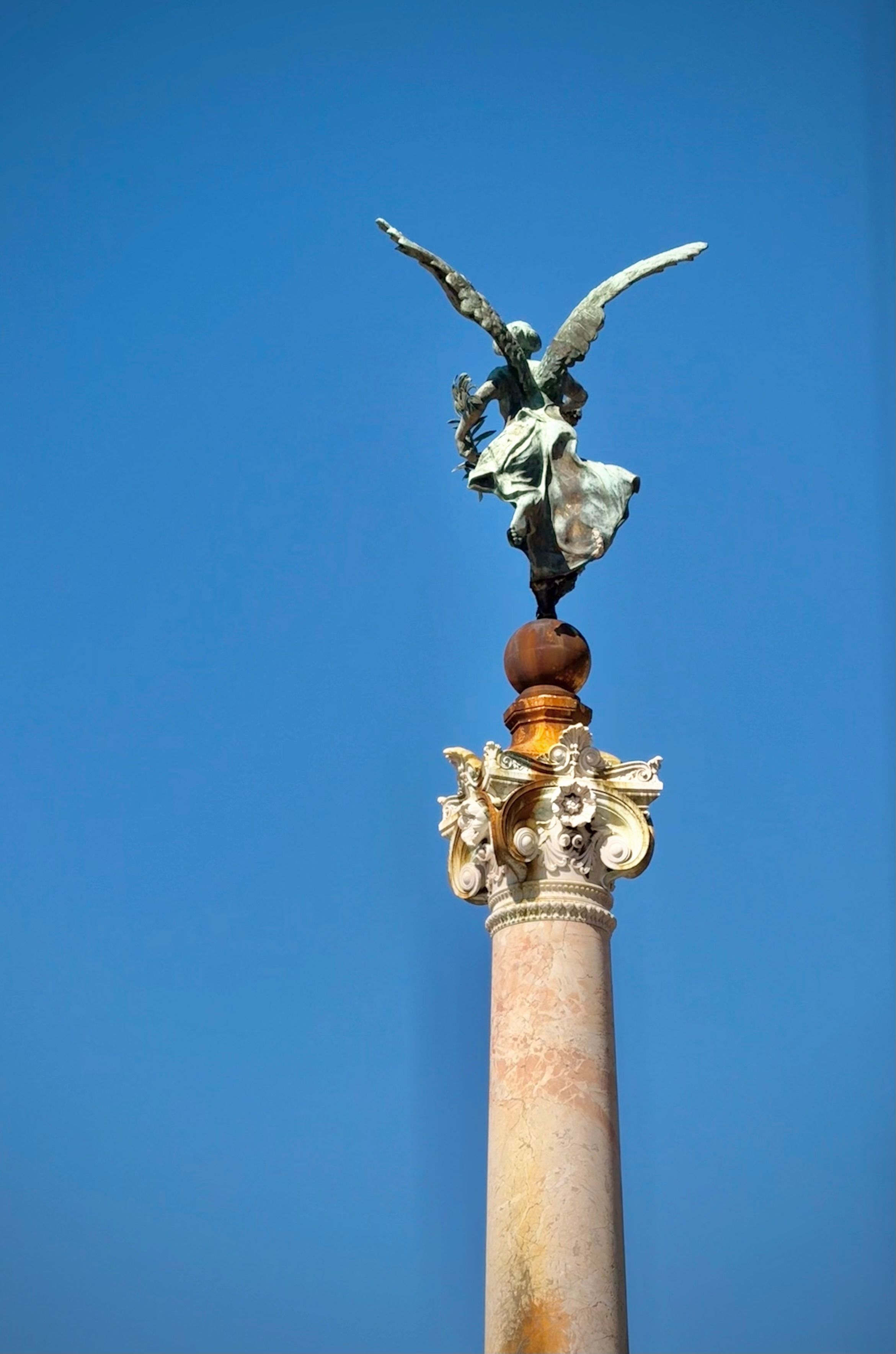 Majestic Angel Statue on Column in Rome · Free Stock Photo