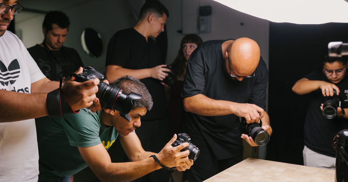 Photographers capturing a delicious Brazilian dish under studio lights.
