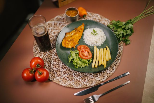 Appetizing Brazilian dish featuring fish, rice, and veggies, perfect for a wholesome meal.