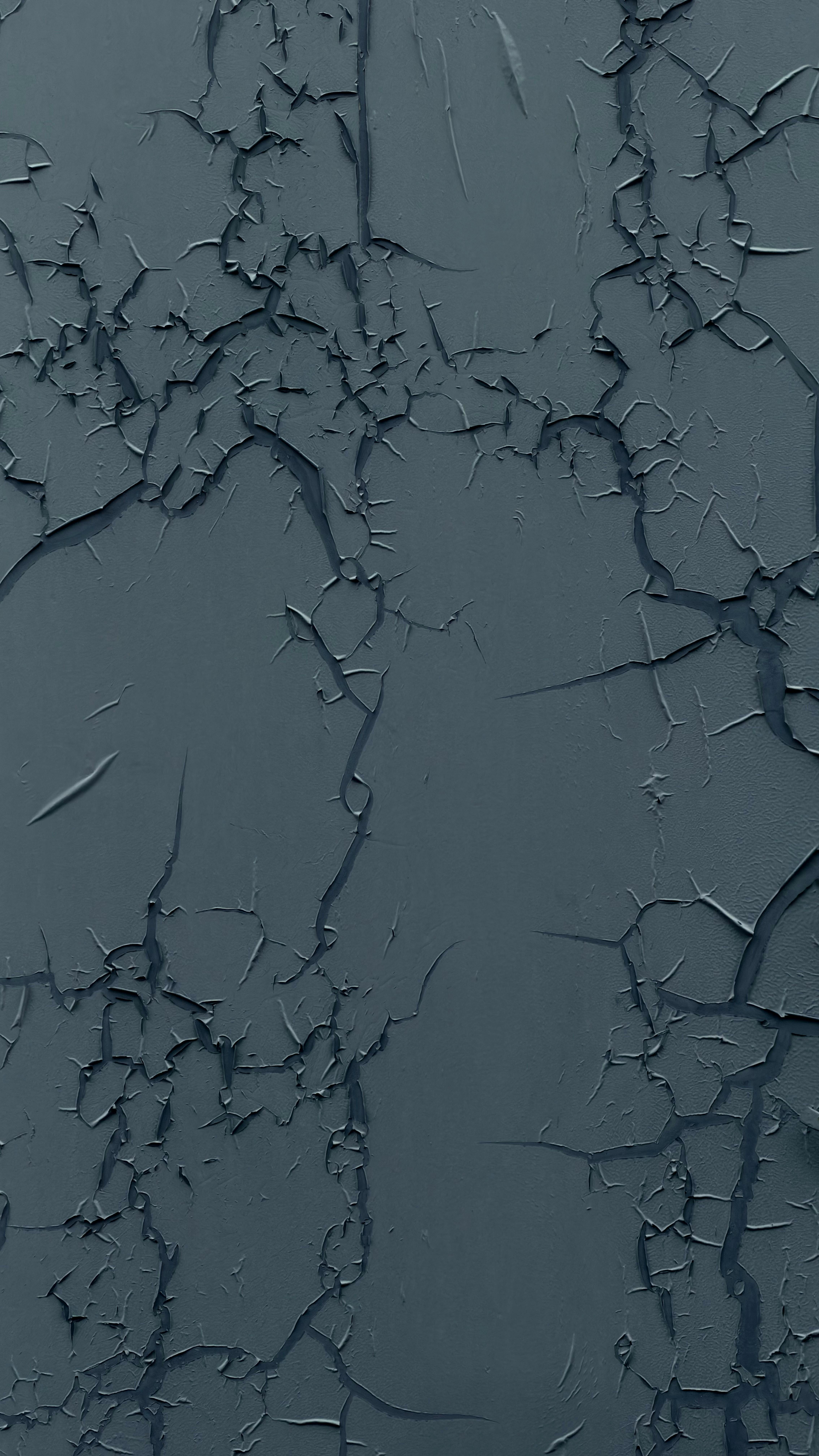 grátis Detalhe texturizado de uma superfície pintada de azul, rachada e desgastada, criando um aspecto rústico. Foto profissional