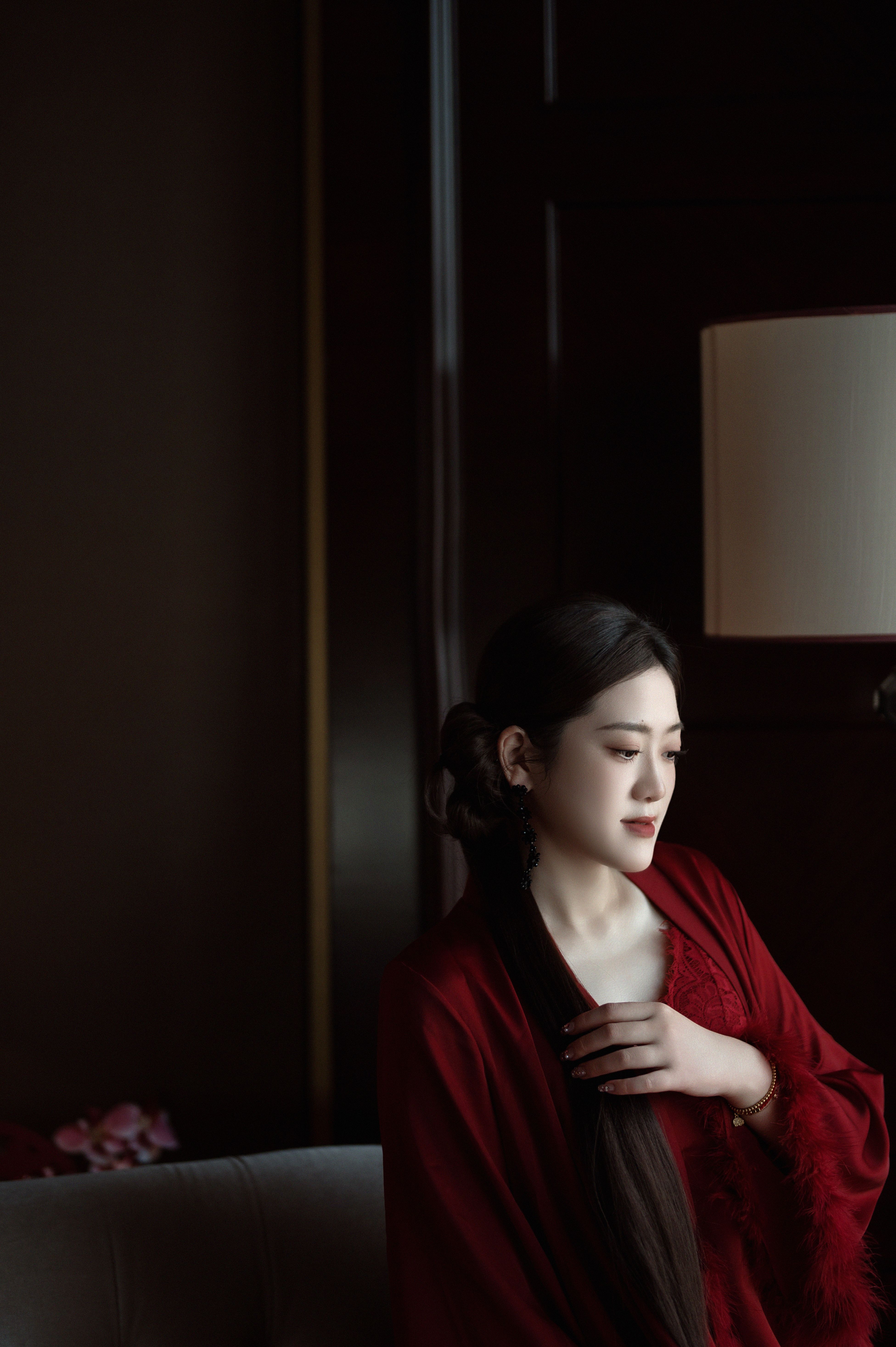 Elegant Woman in Traditional Red Dress Indoors · Free Stock Photo