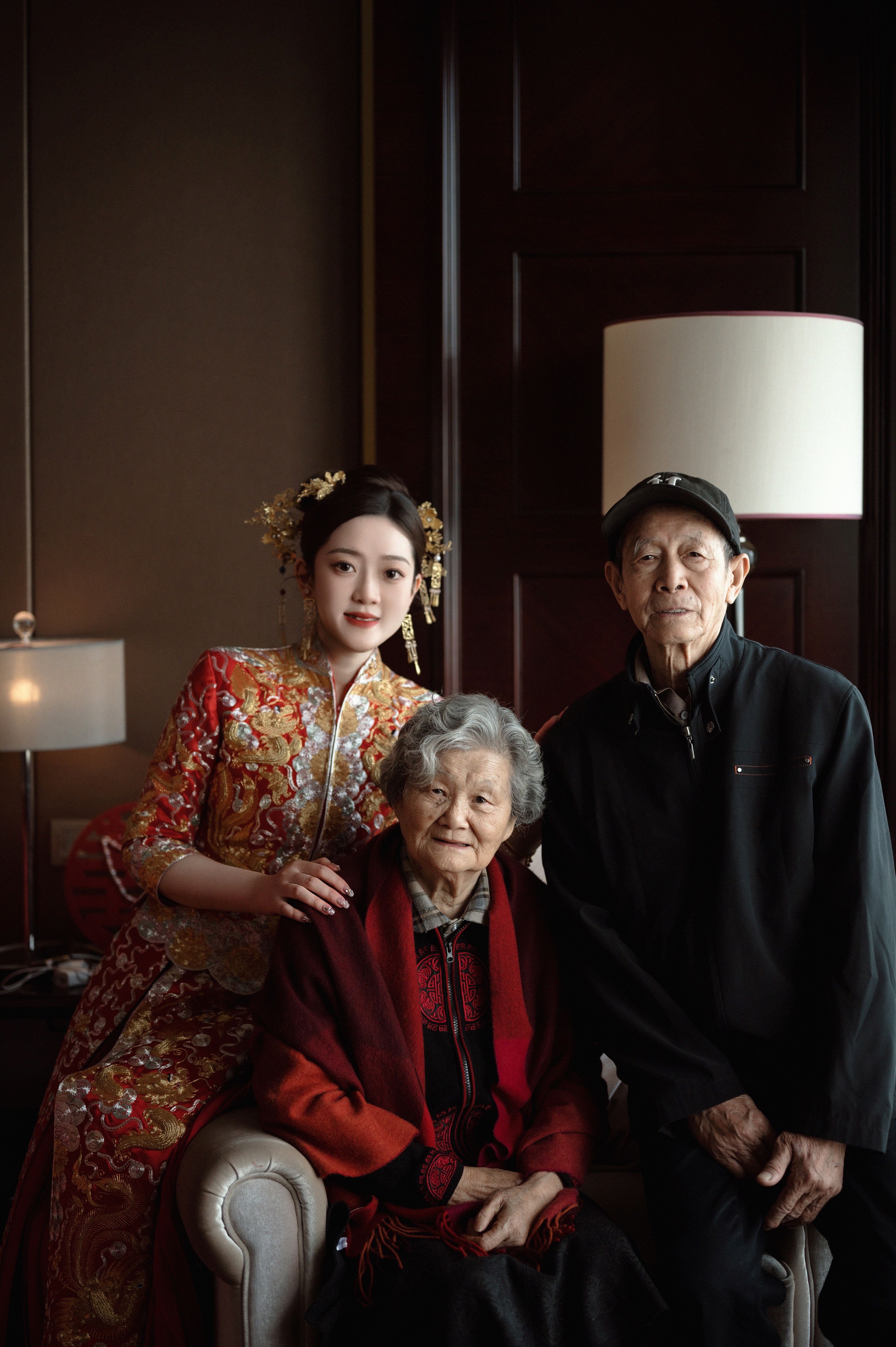 Family Portrait with Three Generations Indoors · Free Stock Photo
