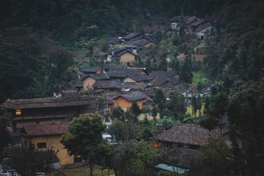 Charming rustic village surrounded by lush greenery in Ha Giang, Vietnam.