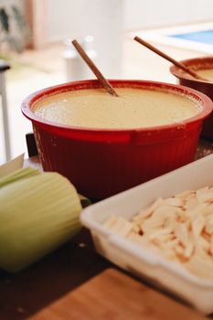 Closeup of ingredients for traditional Brazilian pamonha preparation, highlighting the culinary culture.