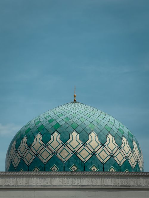 Free Close-up of the beautiful dome of Masjid Negeri Sarawak in Kuching against a clear sky. Stock Photo