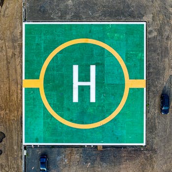 Top-down view of a colorful helipad in Jakarta, showcasing bold geometric design.