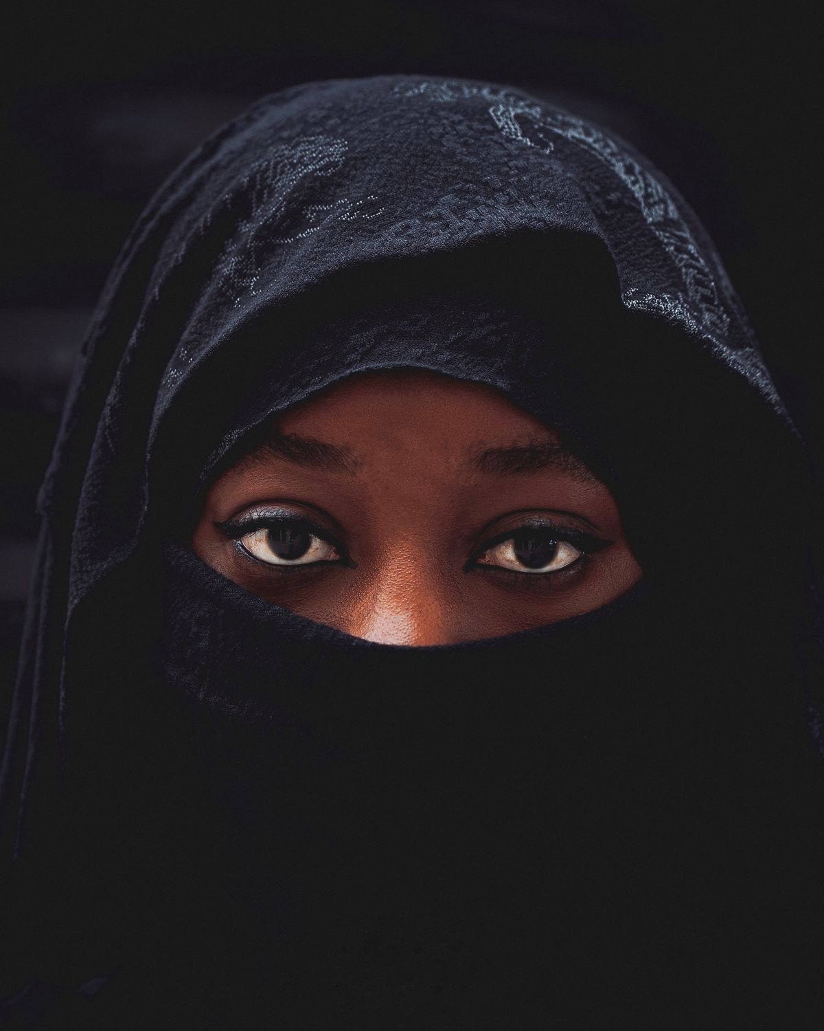 Portrait of Woman in Black Hijab with Intense Eyes · Free Stock Photo