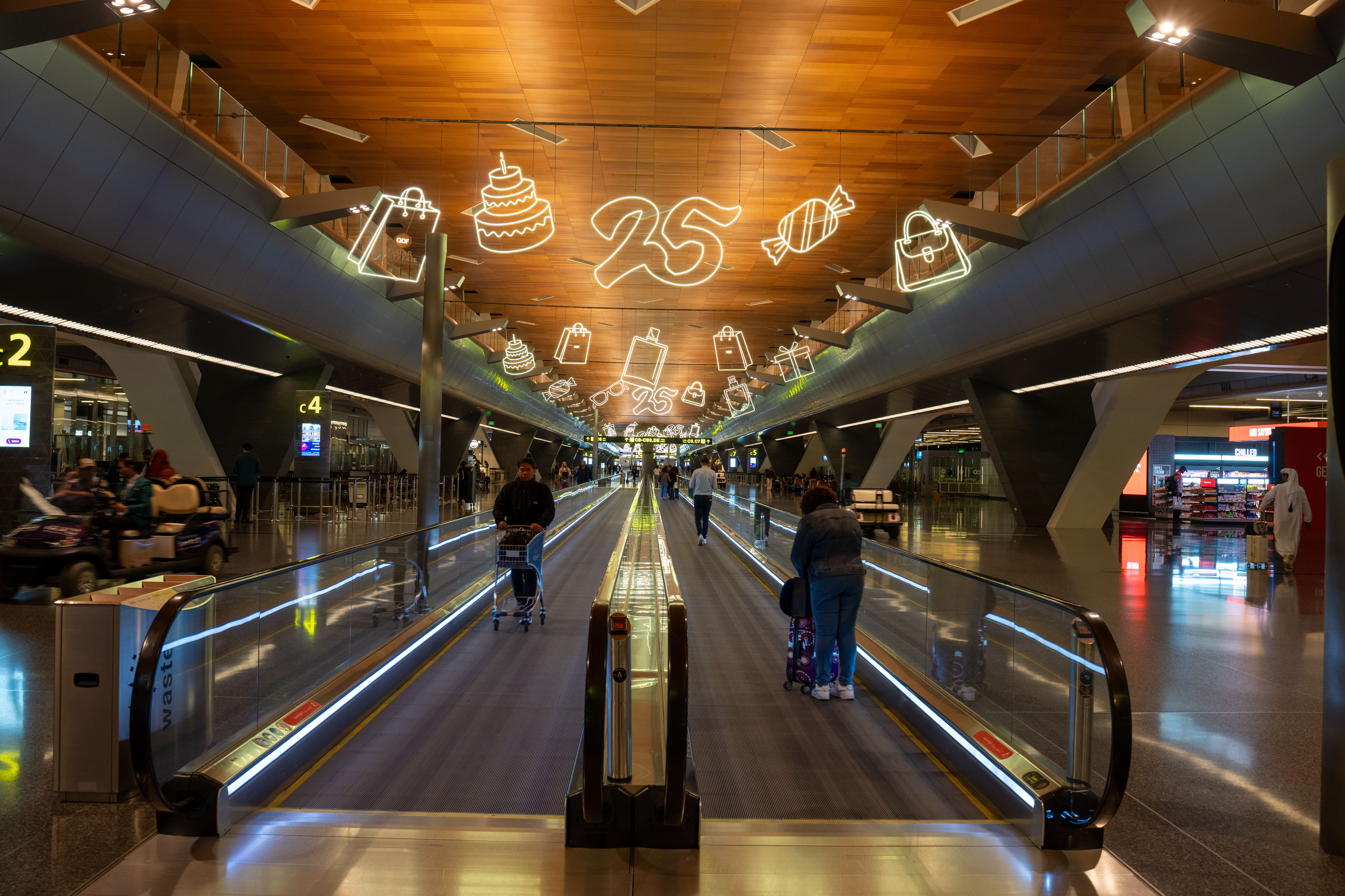 Doha Airport Terminal with Travelers and Decor · Free Stock Photo