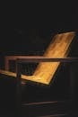 Elegant Minimalist Wooden Chair in Dark Ambiance