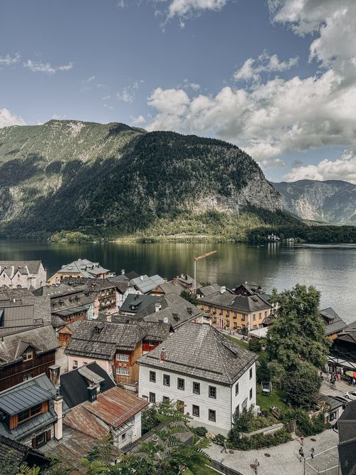 Free Picturesque view of Hallstatt village and lake surrounded by majestic Austrian Alps. Stock Photo