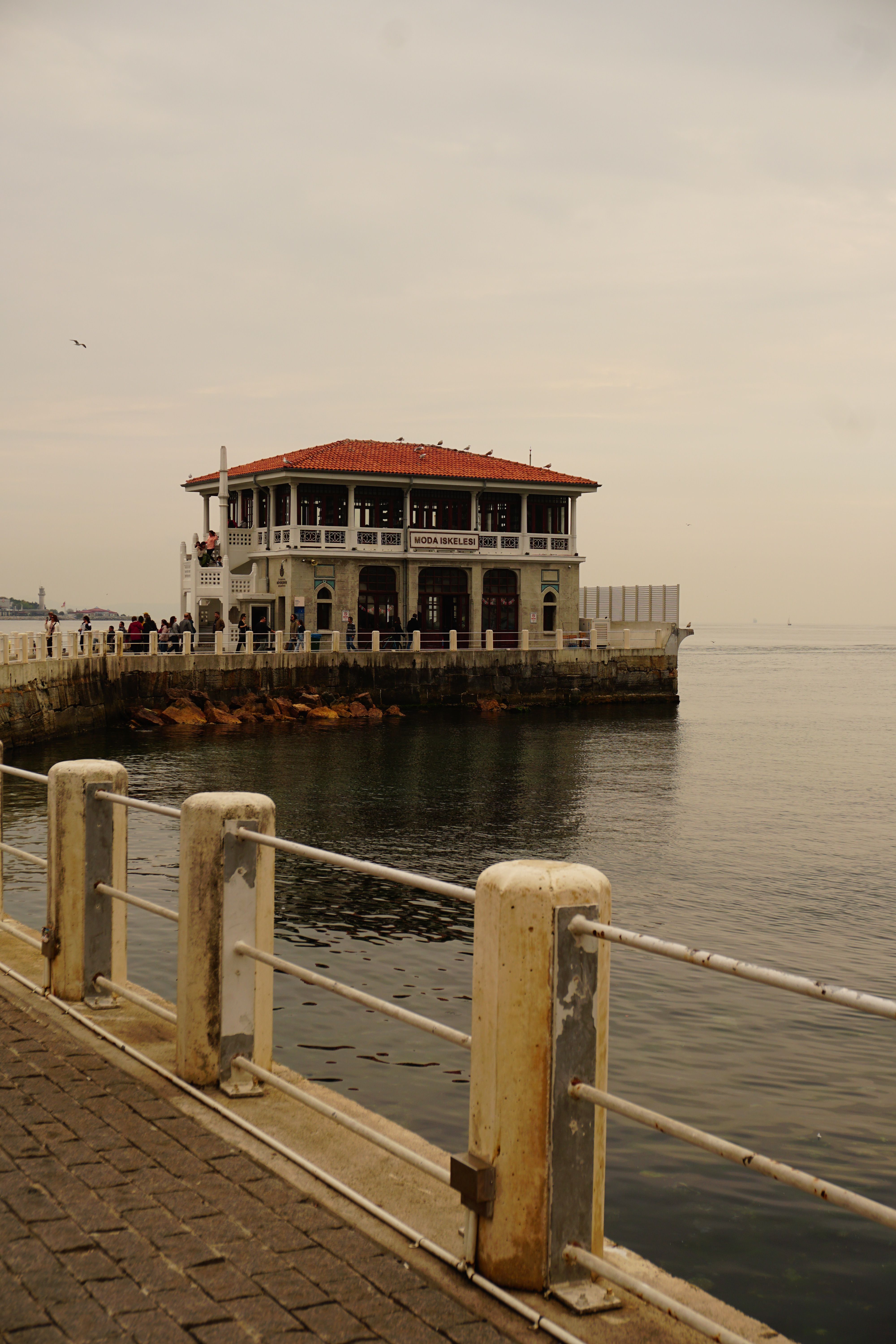 Historical Dockside Building by the Sea · Free Stock Photo