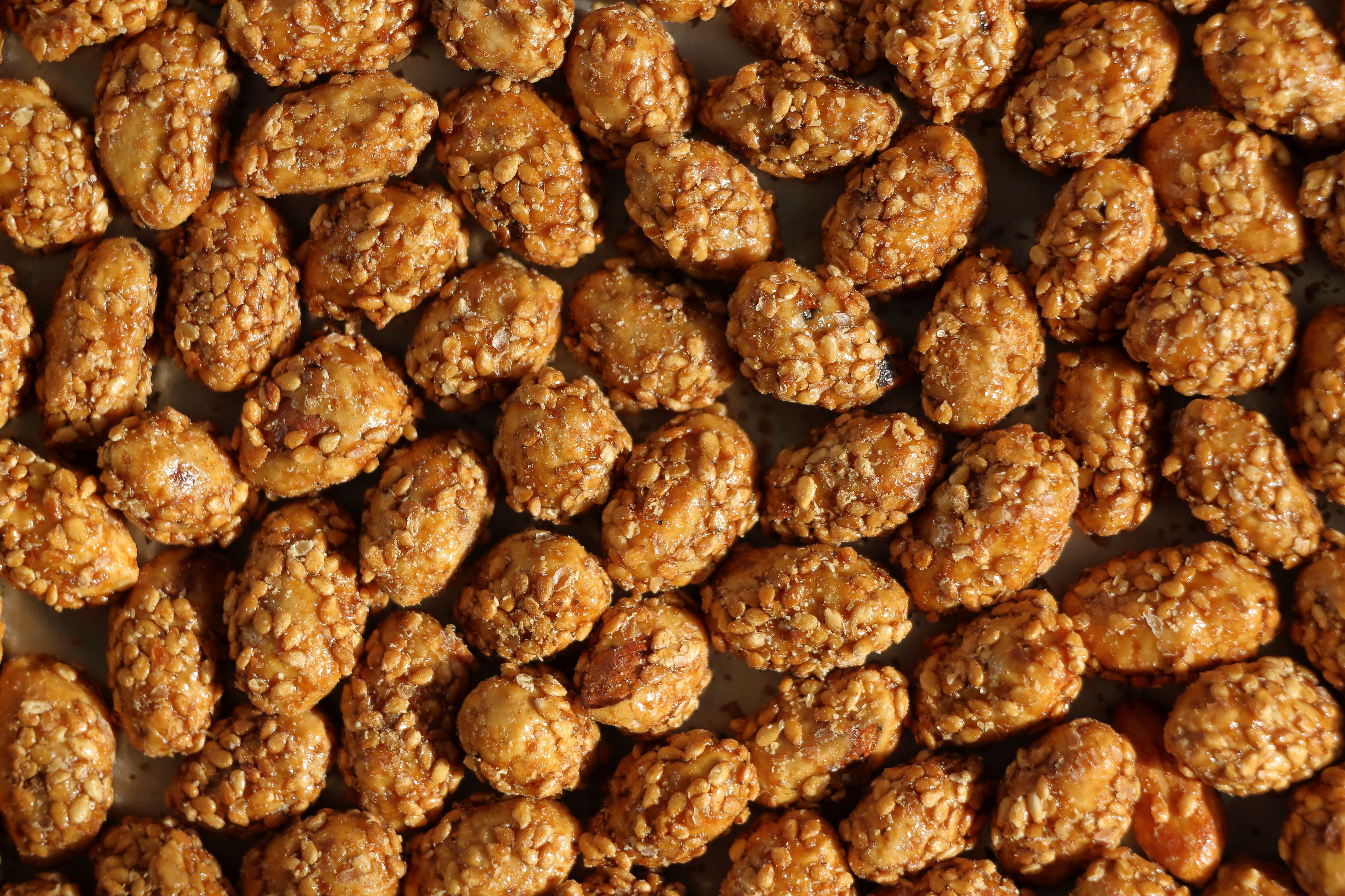 Close-up of Adnon's crunchy coated peanuts with a spiced sugar glaze