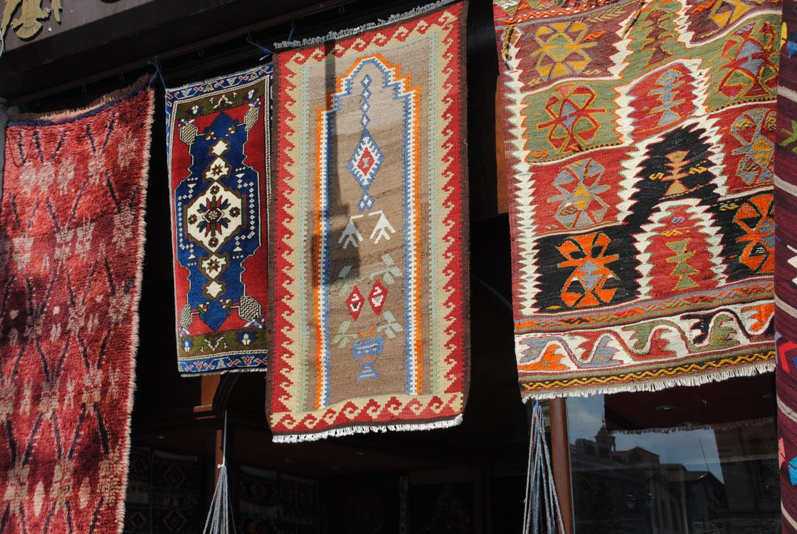 Filded Hanging Rug Colorful Traditional Rugs Hanging Outdoors · Free Stock Photo