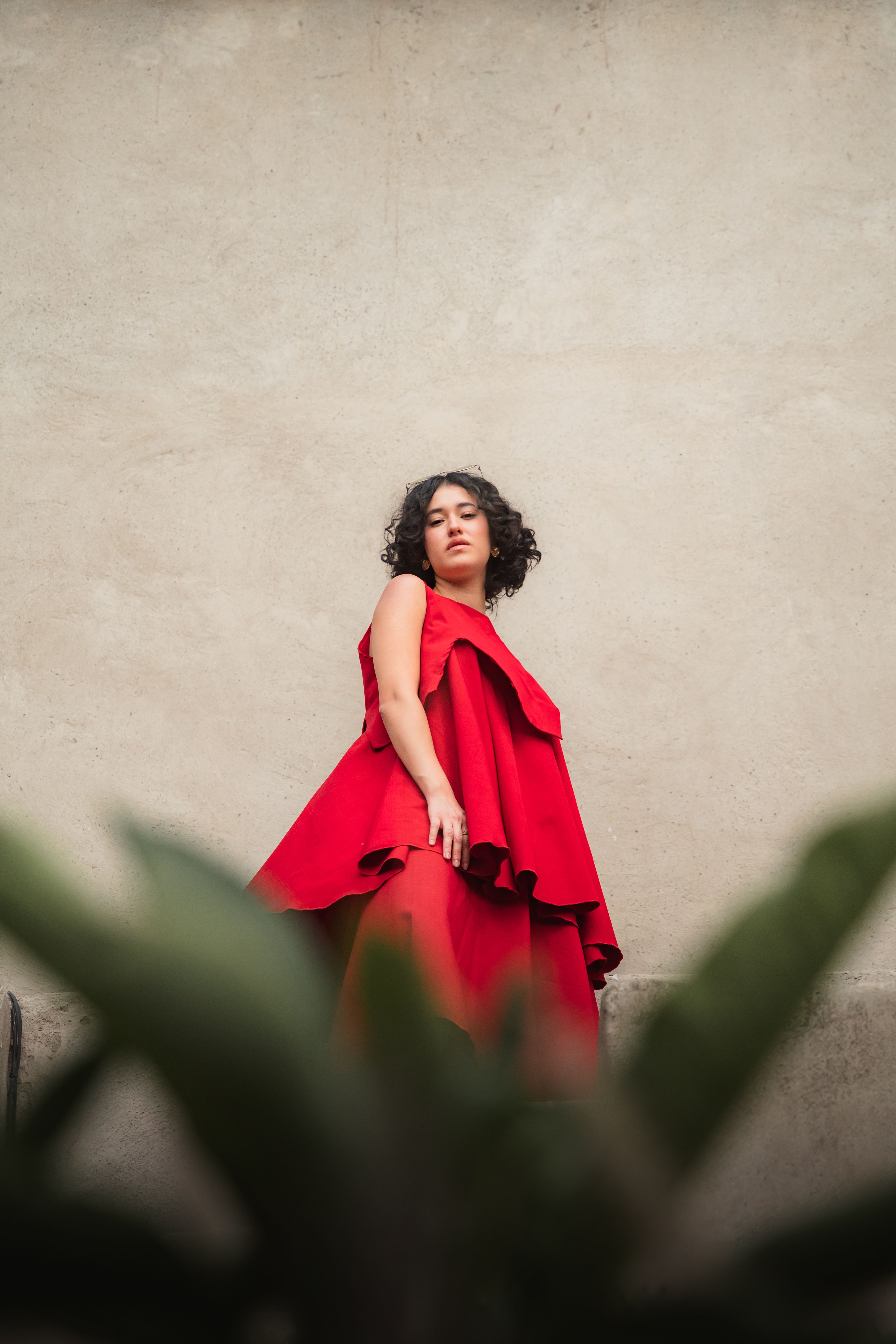 Elegant Woman in Red Dress Outdoors Fashion Shot · Free Stock Photo