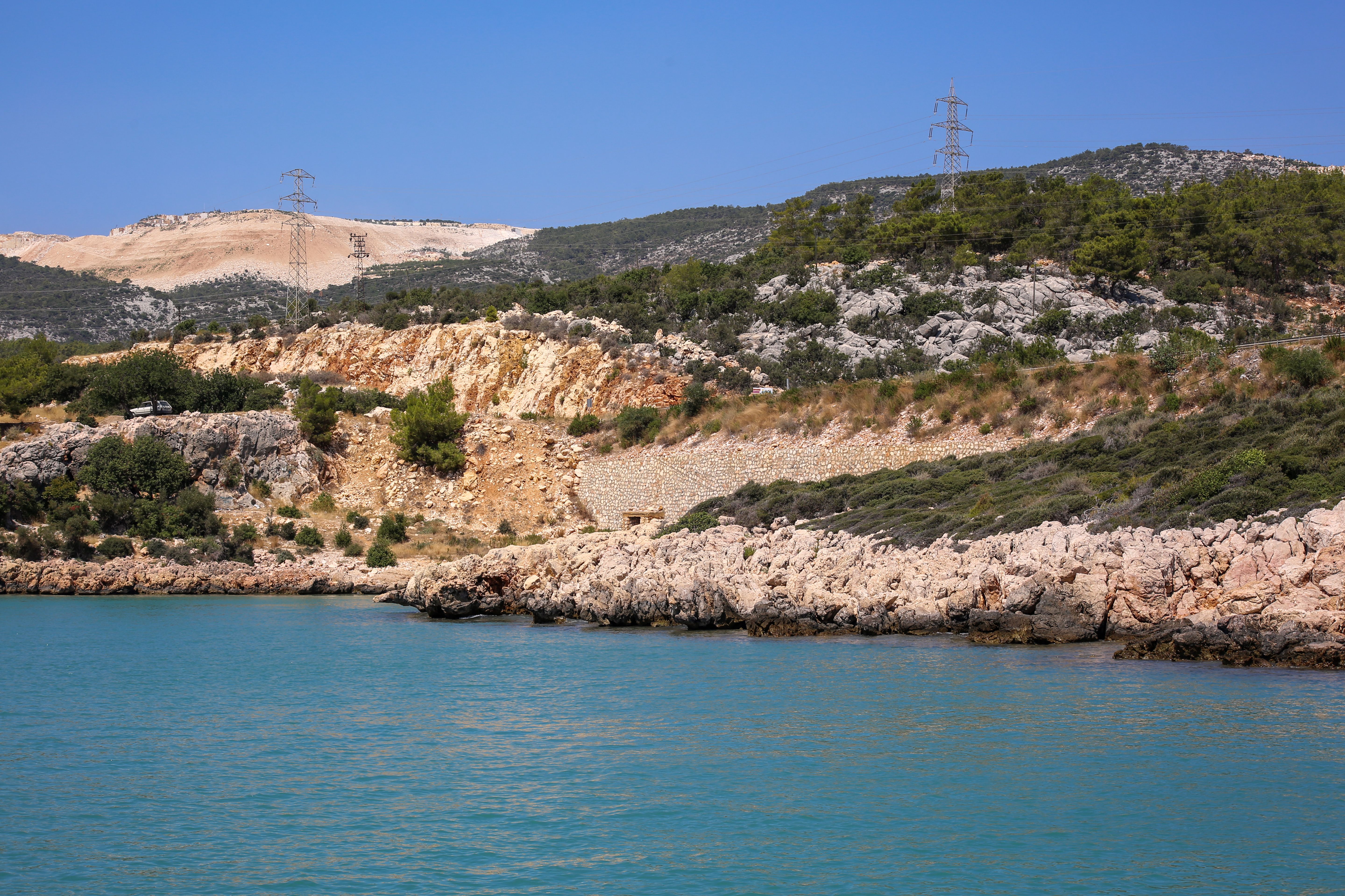 Scenic Coastal Landscape with Rocky Hills · Free Stock Photo
