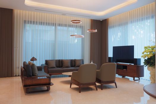 Stylish living room with contemporary furniture and elegant lighting. - Fotografer Sidoarjo