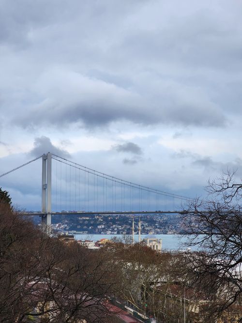 Free Scenic view of the Bosphorus Bridge in Istanbul with moody sky and cityscape. Stock Photo
