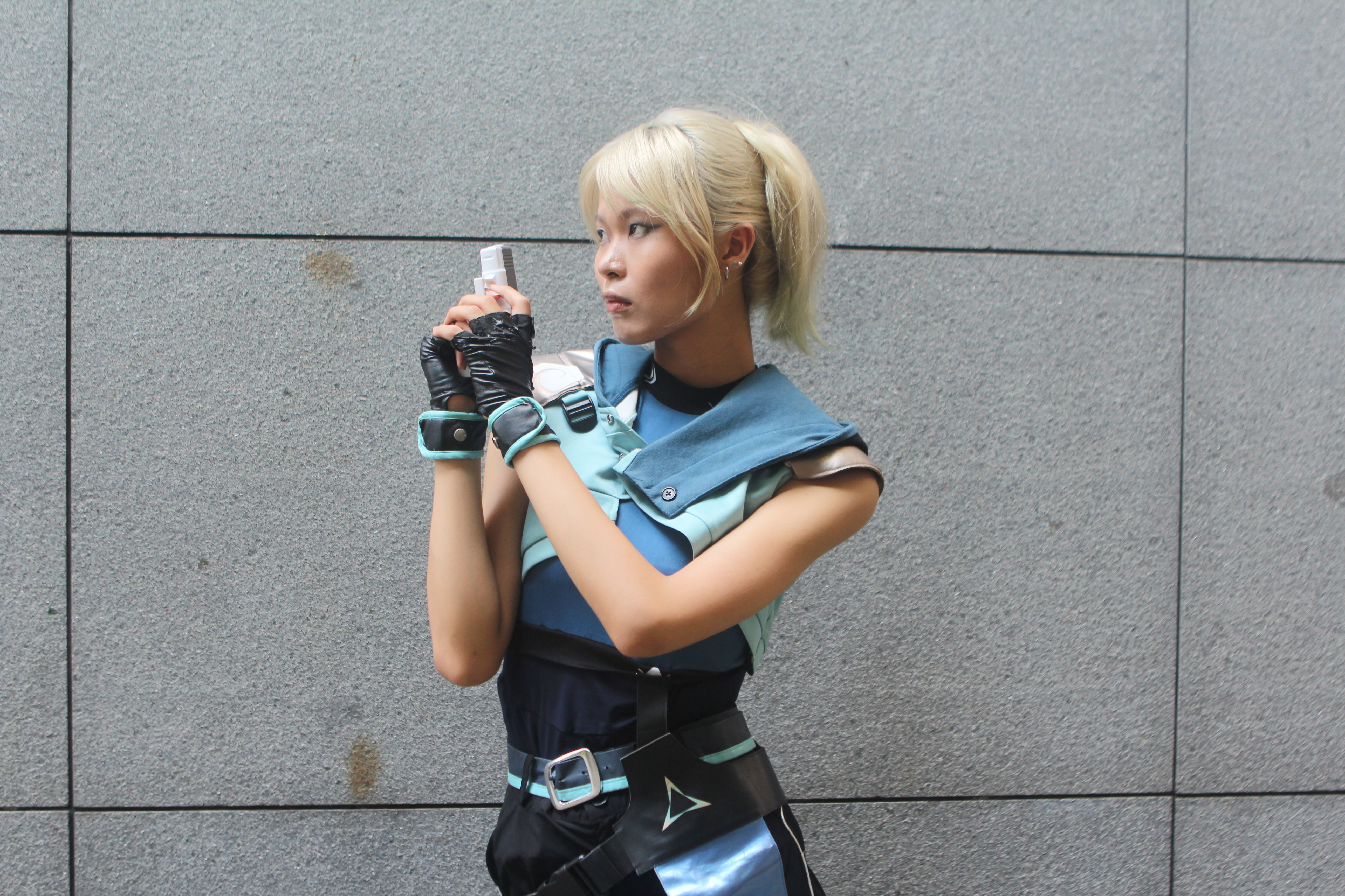 Cosplay Portrait of a Character with Blaster · Free Stock Photo