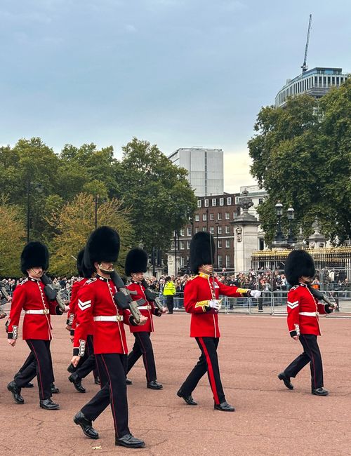 Free Iconic red uniformed British guards marching near Buckingham Palace. Stock Photo