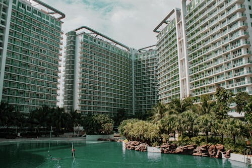Swimming Pool Near High-rise Buildings