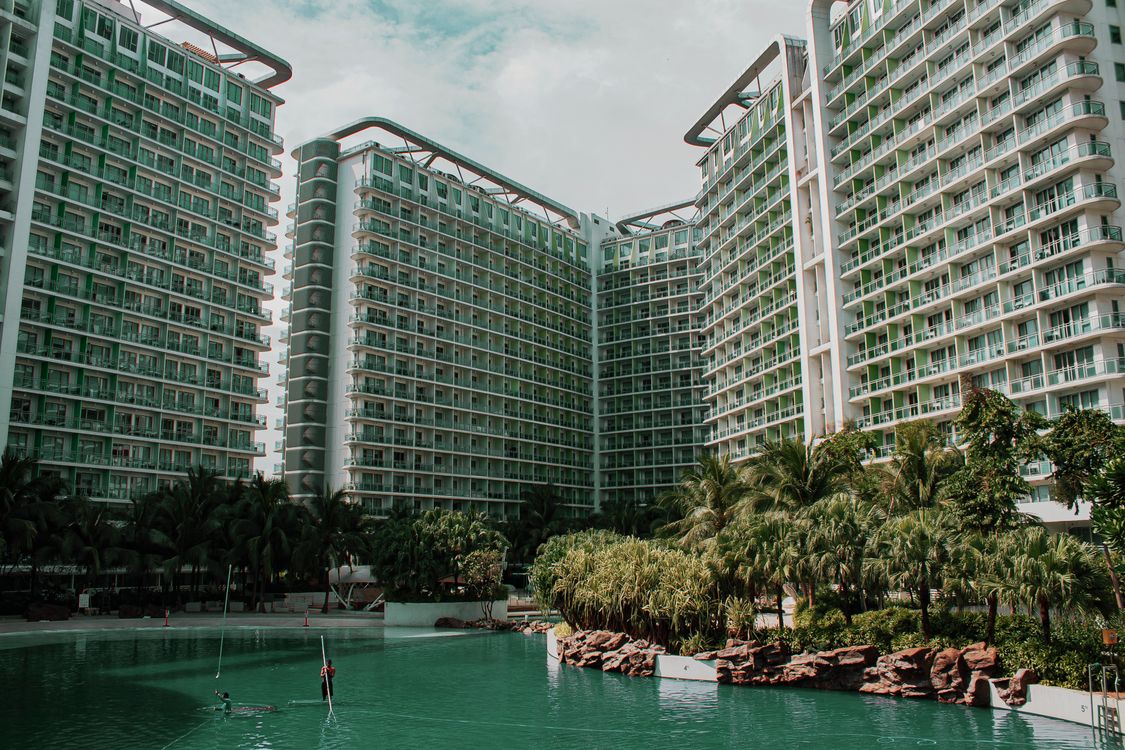 Swimming Pool Near High-rise Buildings · Free Stock Photo