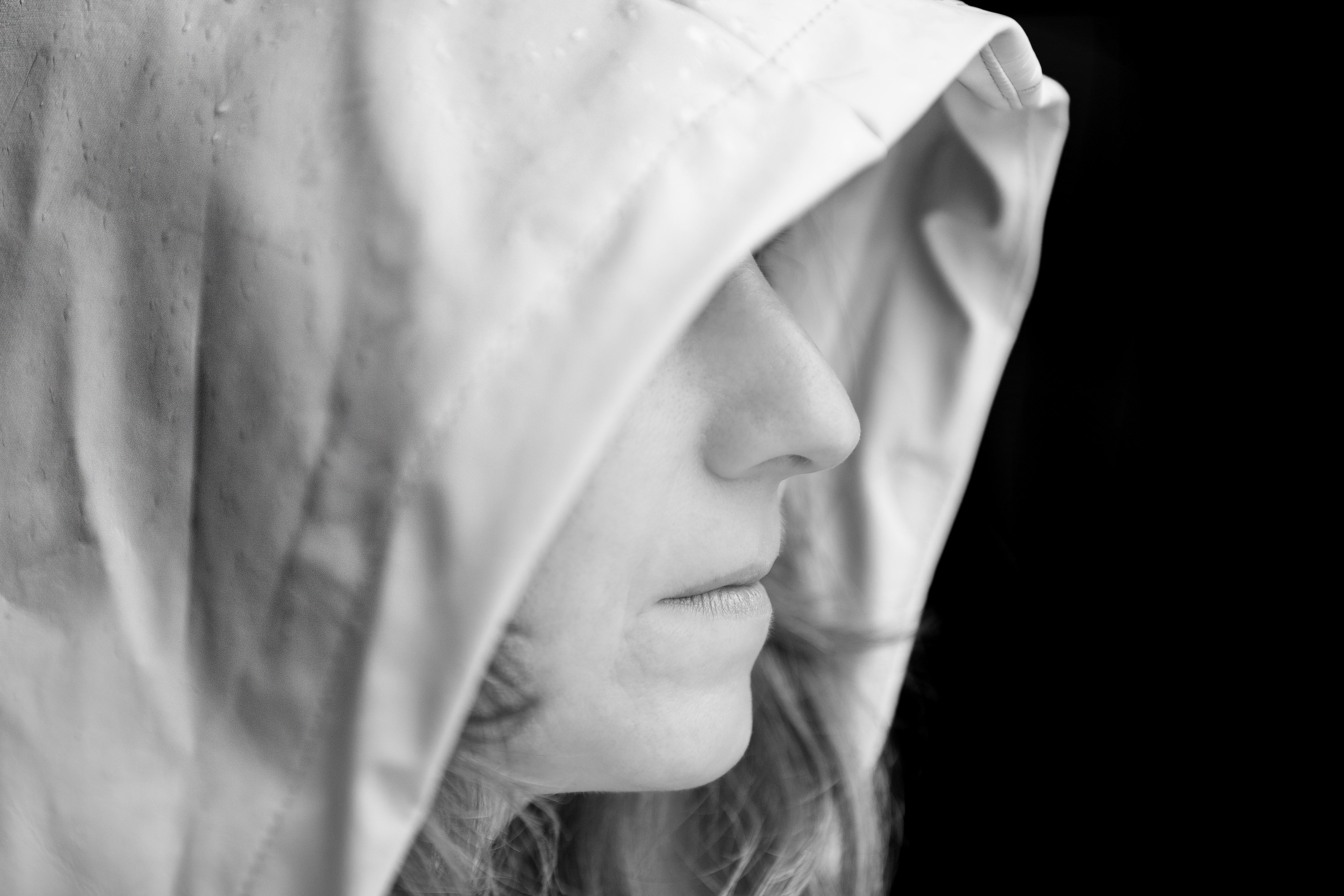 Moody Black and White Portrait of Hooded Figure · Free Stock Photo