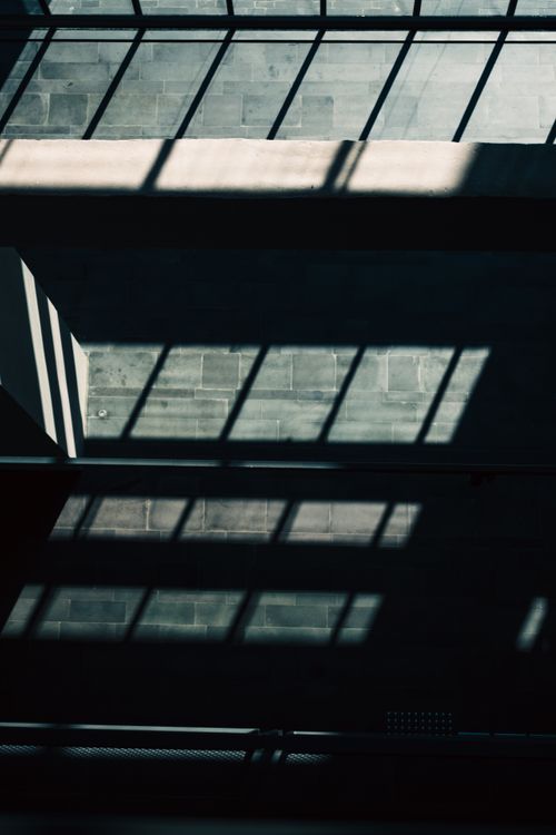 Free Geometric shadows cast on industrial interior with strong lines and contrasts. Stock Photo