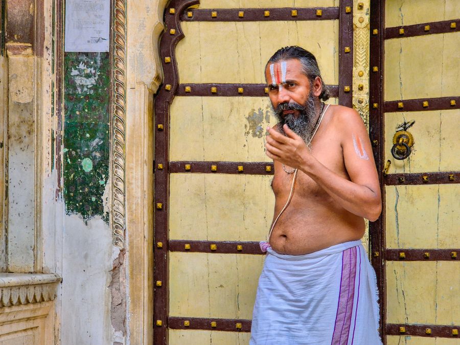 Traditional Hindu astrologer and Pandit in spiritual setting
