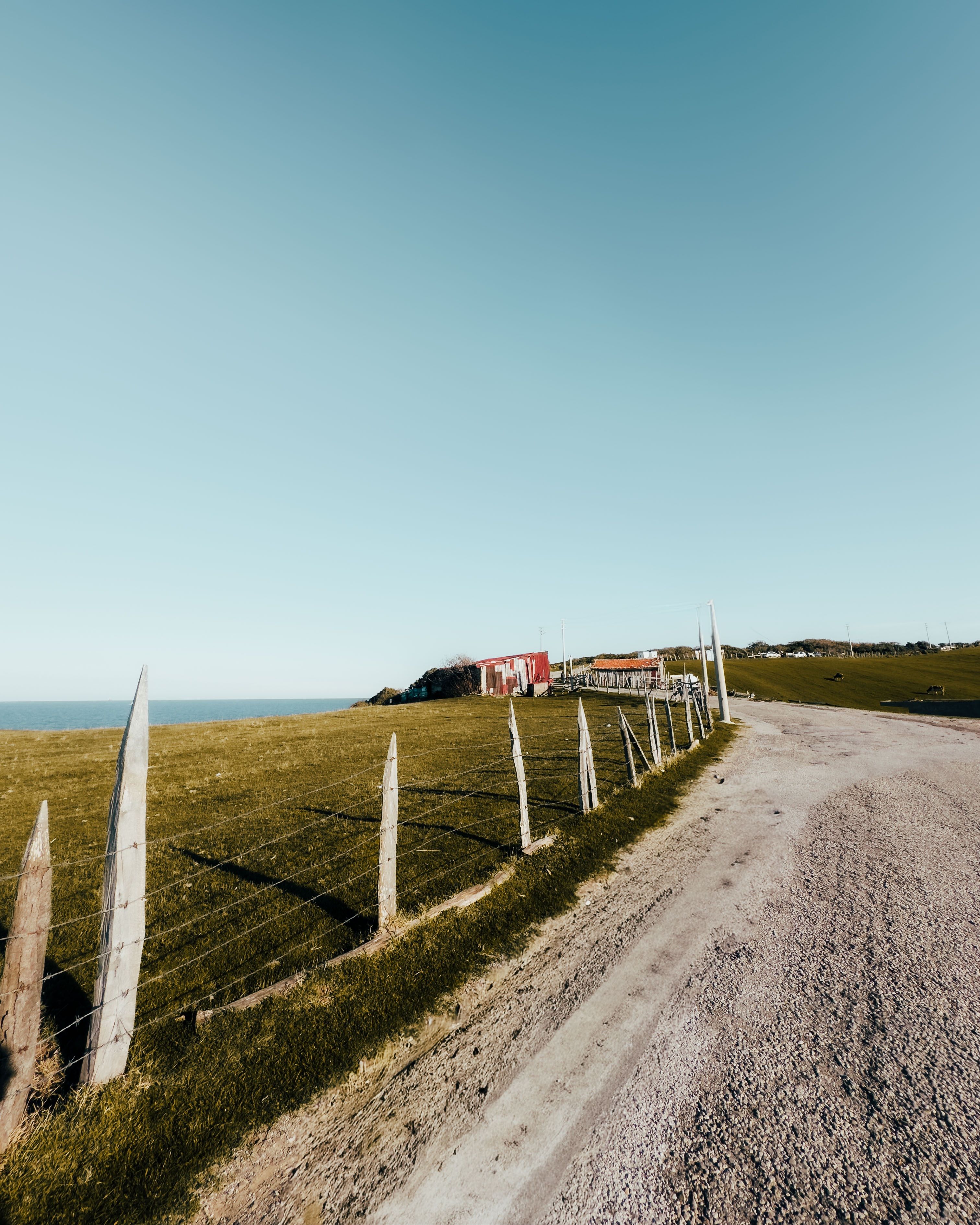 Rural Road and Barn in Scenic Countryside Setting · Free Stock Photo