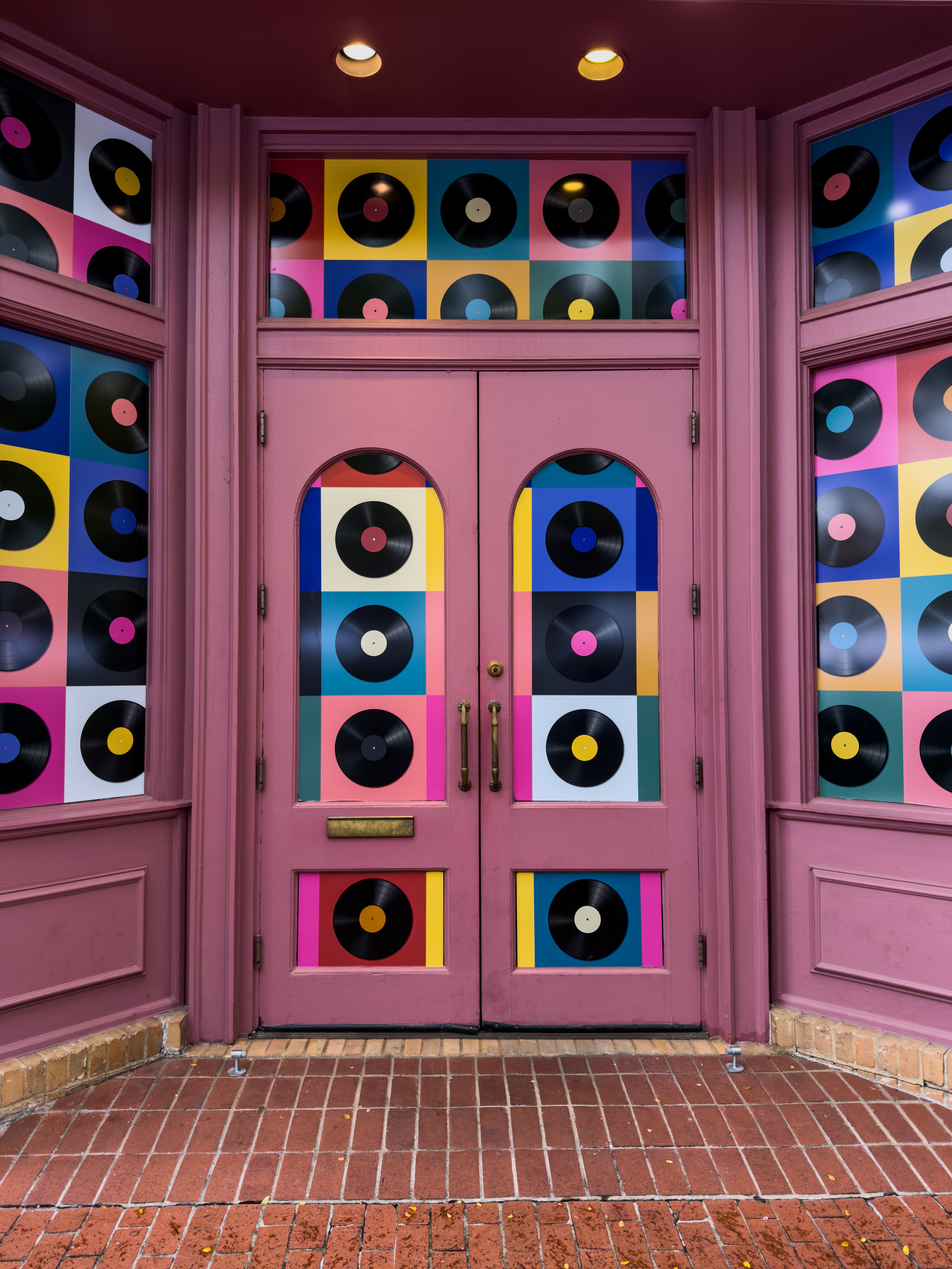 Colorful Vinyl Record Storefront Display · Free Stock Photo