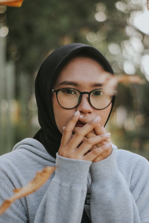 Woman Wearing Eyeglasses and Black Hijab
