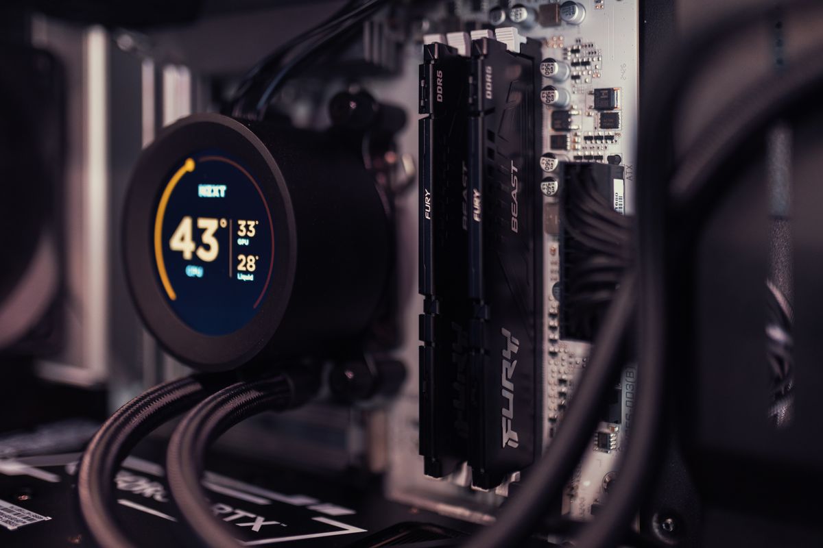 Inside a desktop PC showing the CPU cooler and cooling hardware