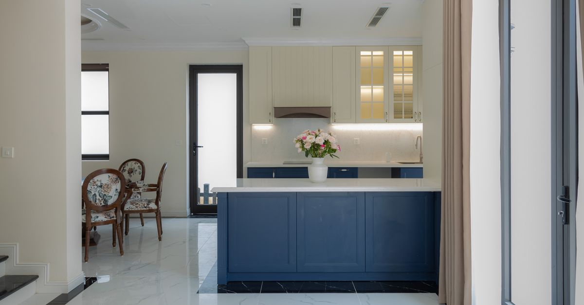 Elegant Modern Kitchen with Blue Cabinetry · Free Stock Photo