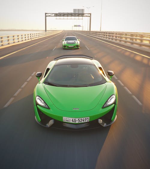 A Green Supercar on a Highway