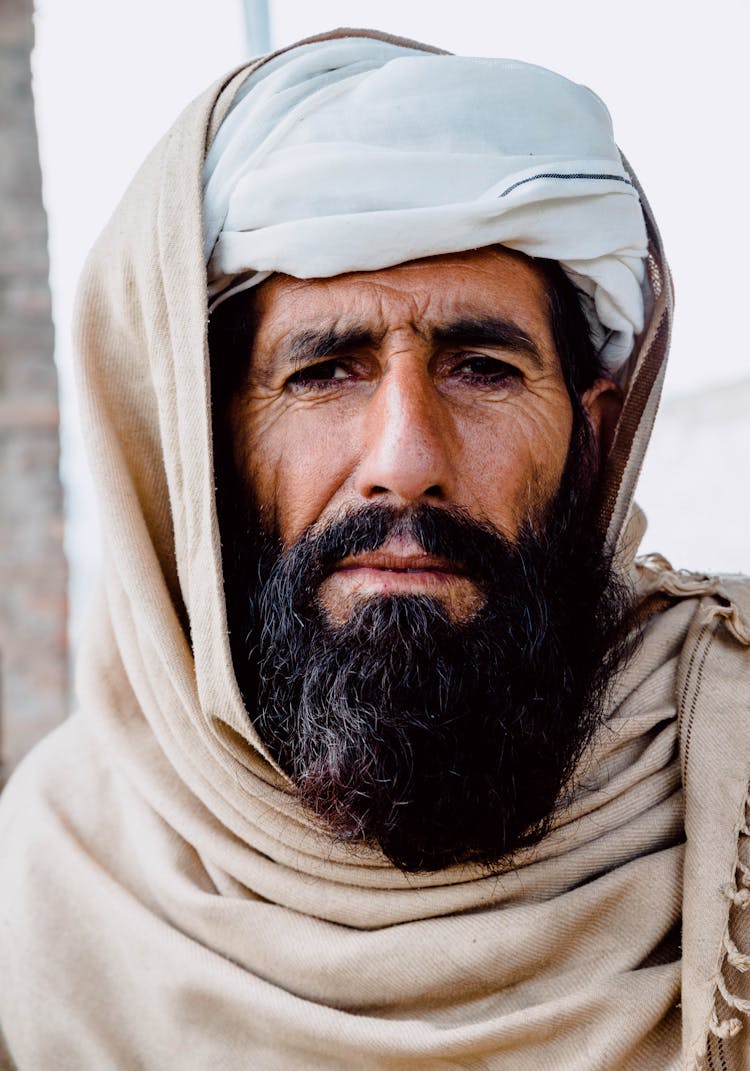 Man Wearing Brown Shawl