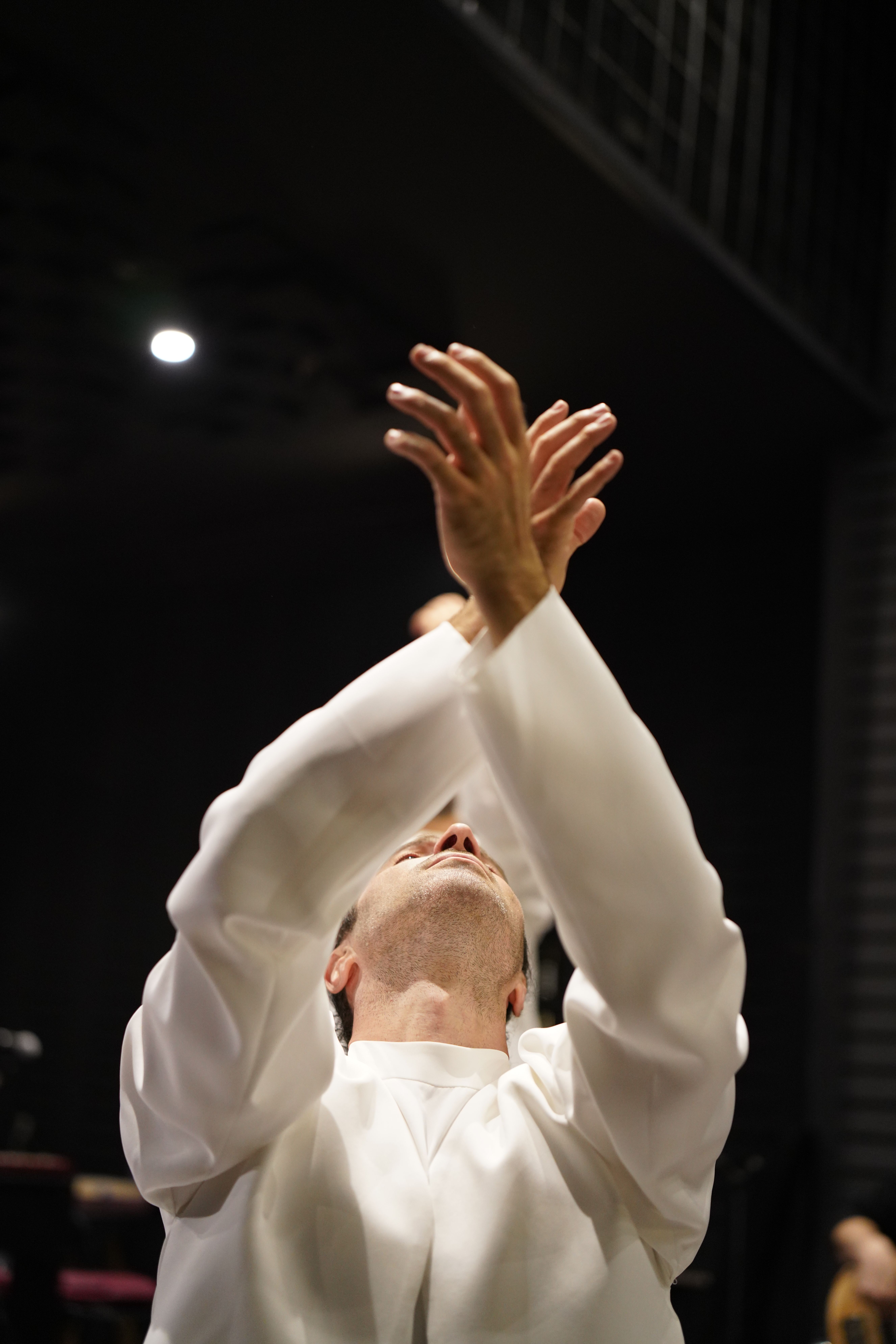 Man in White Robe Raising Hands in Worship · Free Stock Photo