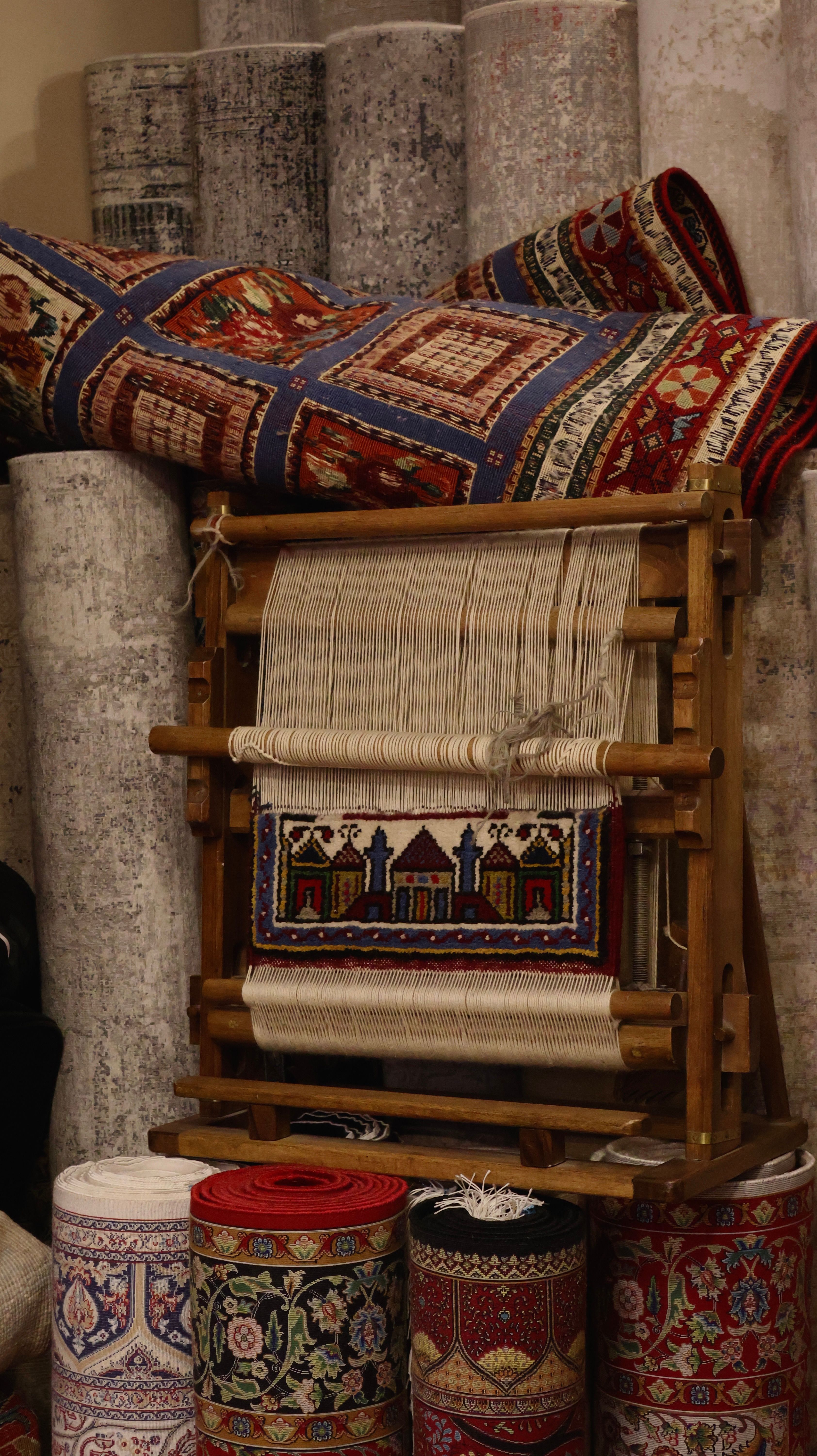 traditional-persian-rug-weaving-loom-with-colorful-carpets-free-stock