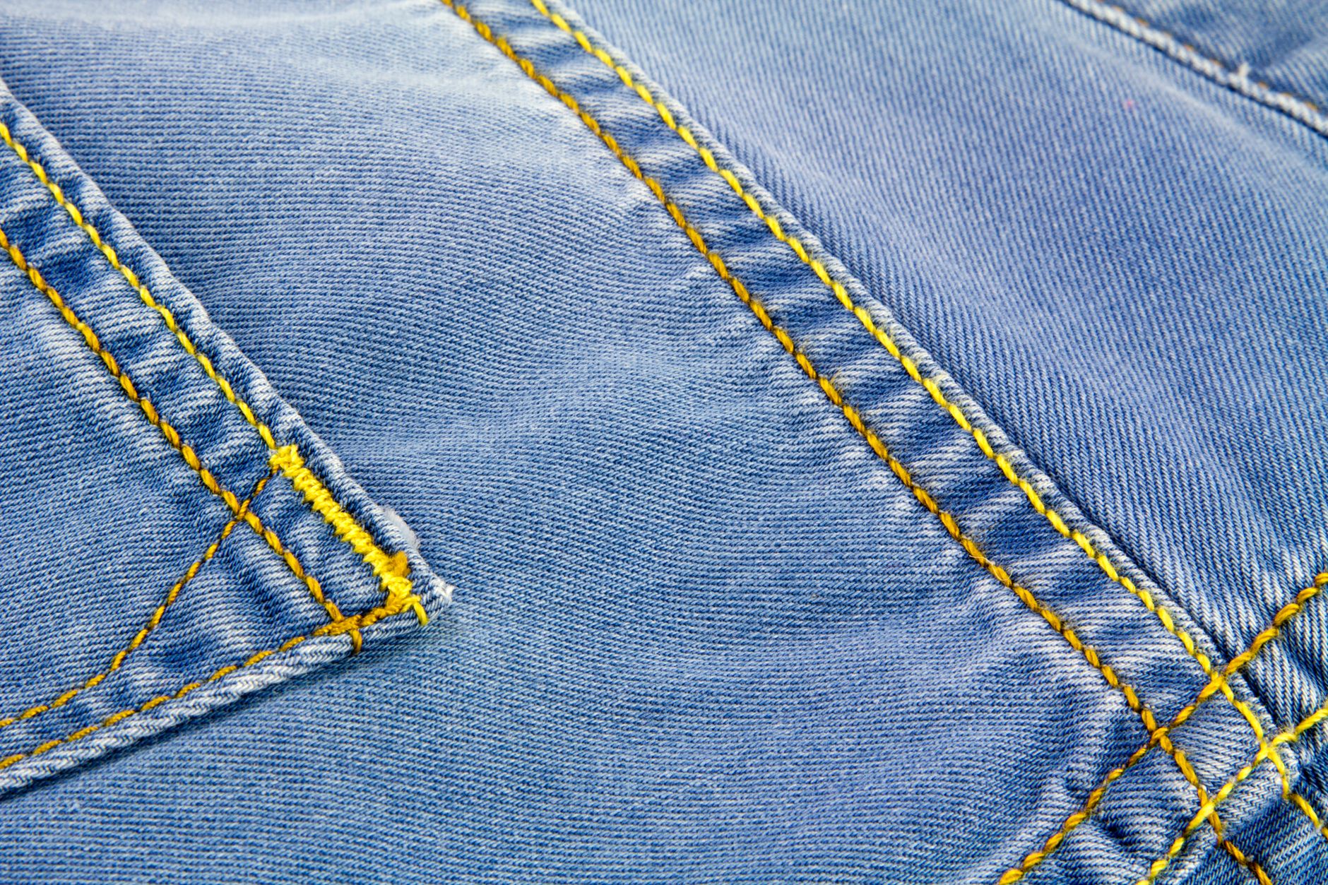 side-by-side comparison of a repaired seam and a new seam on the same fabric type, showing the difference in appearance and integrity