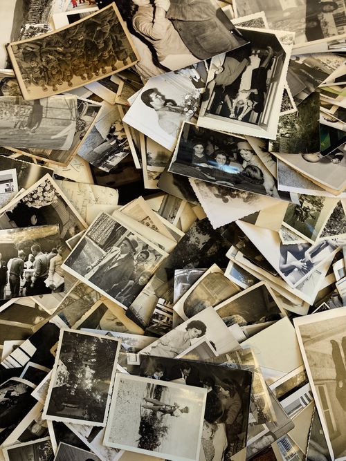 Free A nostalgic collection of old family photographs, capturing timeless memories. Stock Photo
