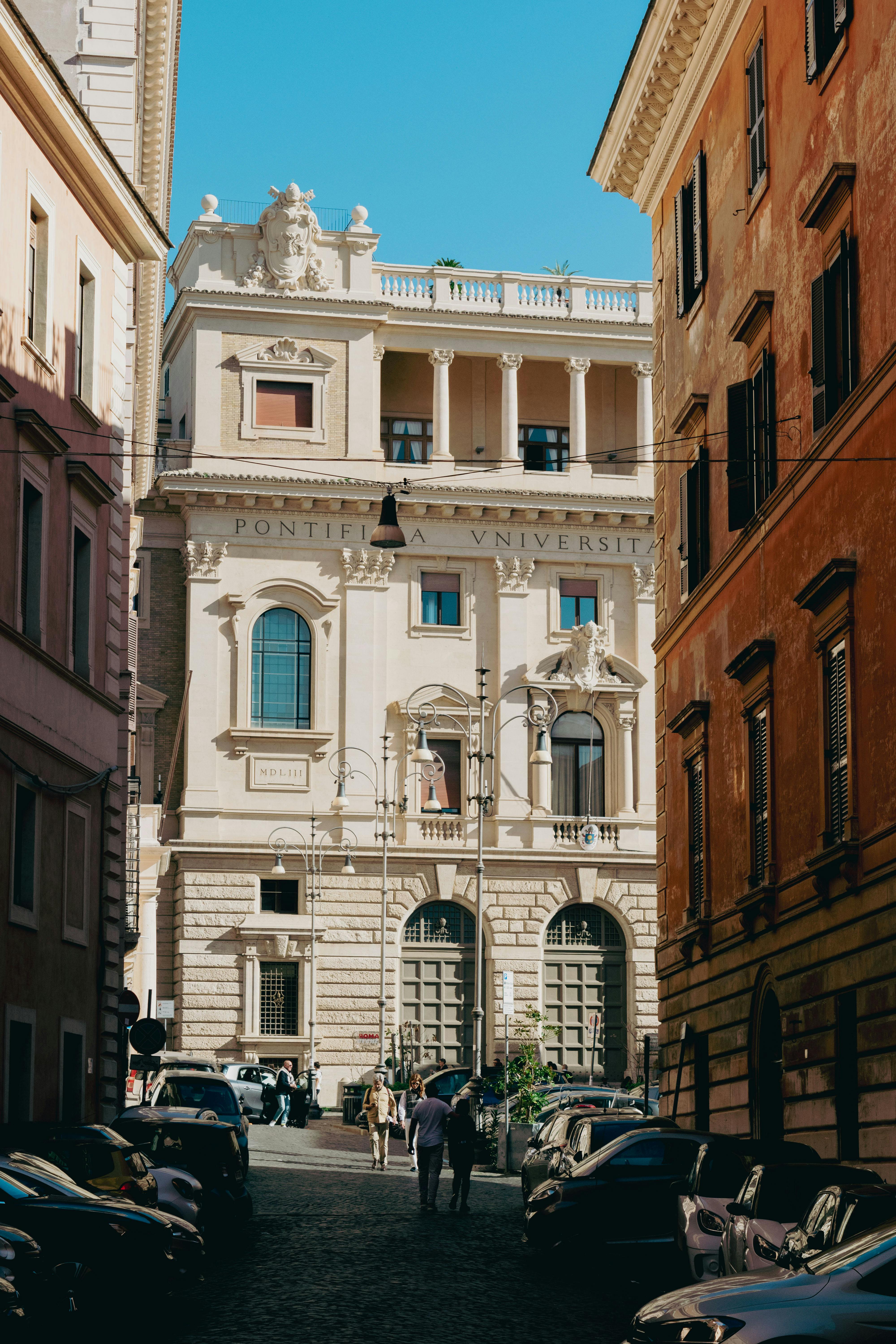 Capture of the historic Pontifical University in Rome showing its classic architectural facade.