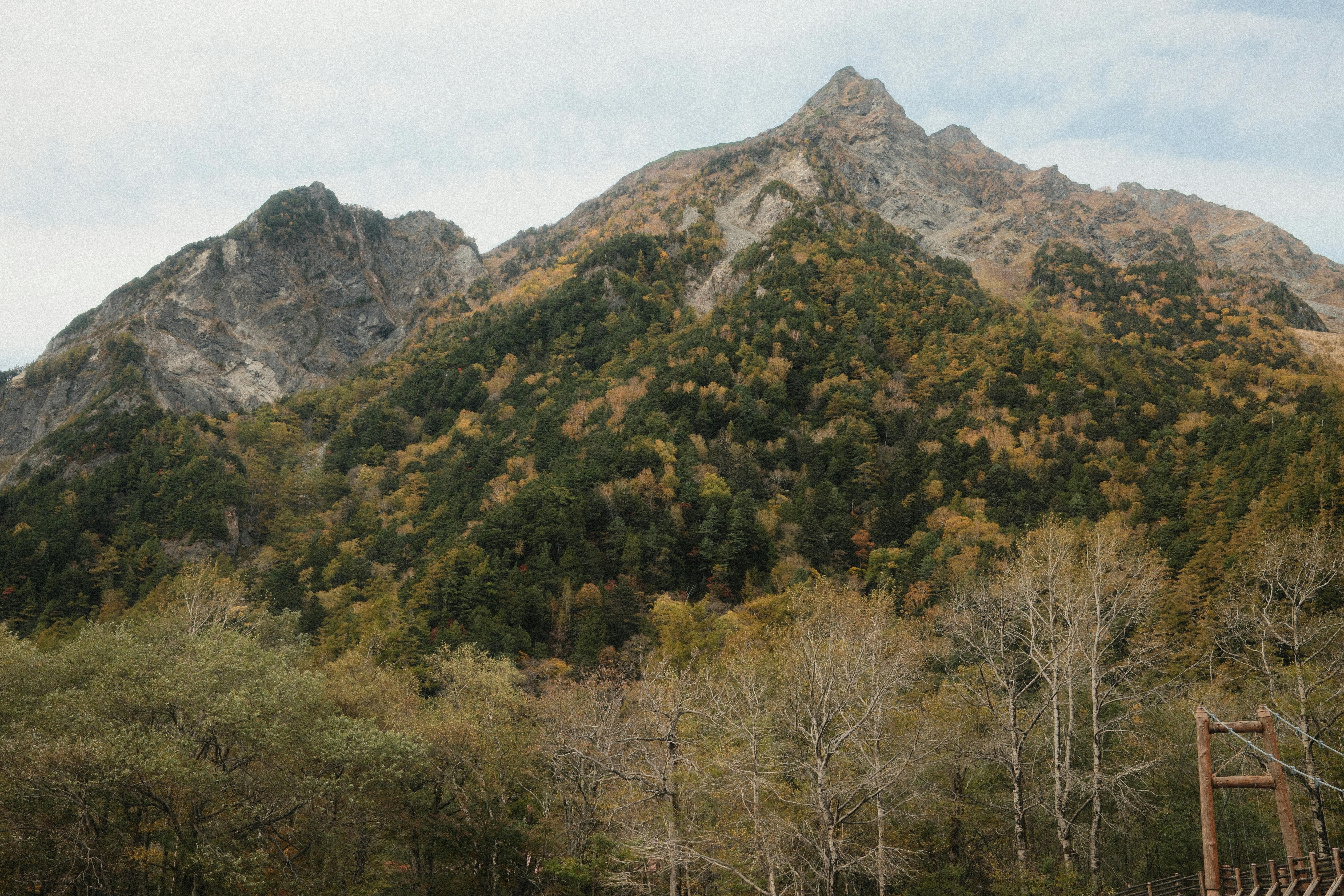 Breathtaking view of Mount Hotaka with autumn foliage in Matsumoto, Nagano, Japan.