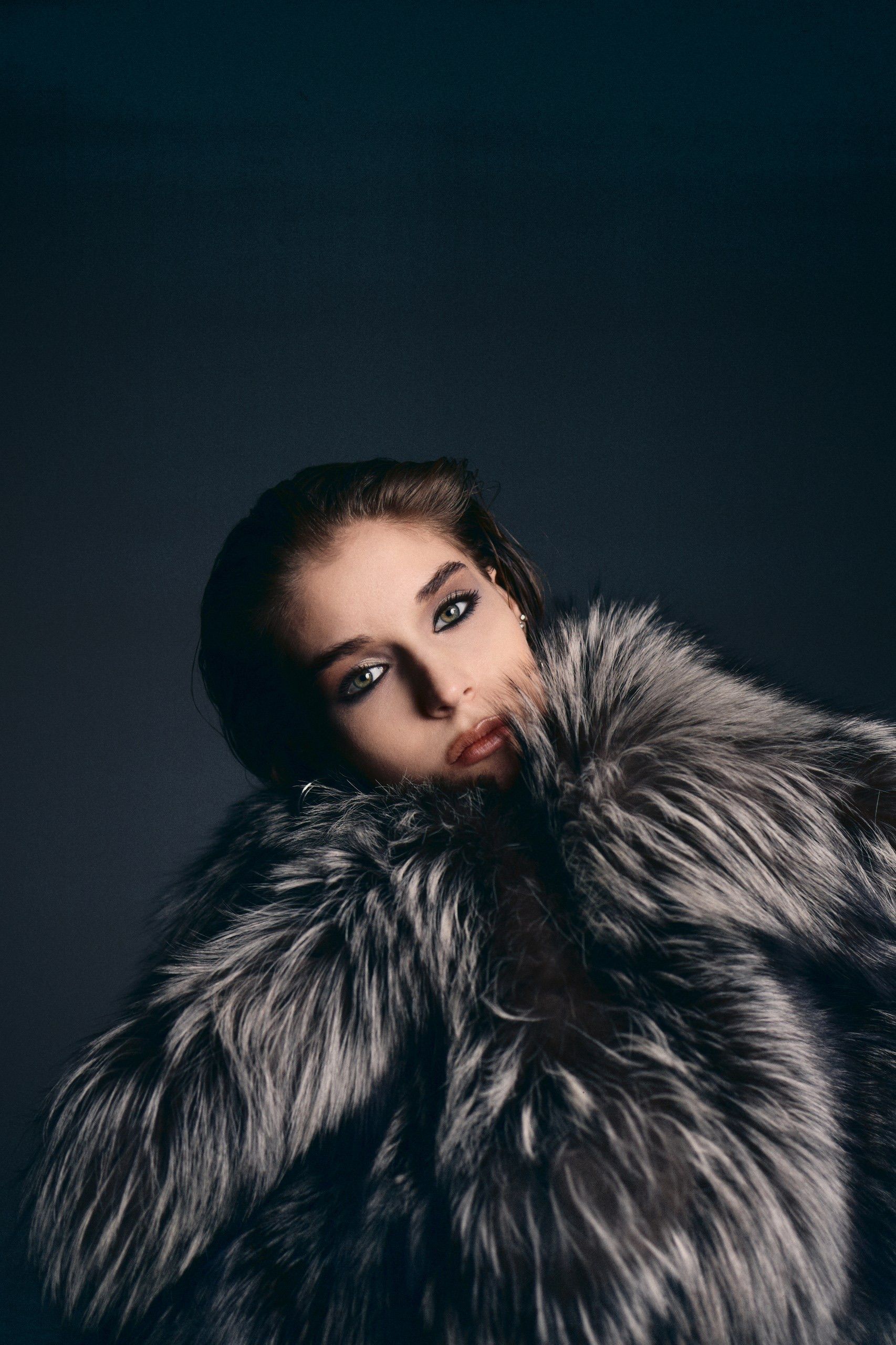Elegant Woman in Luxurious Fur Coat Portrait · Free Stock Photo